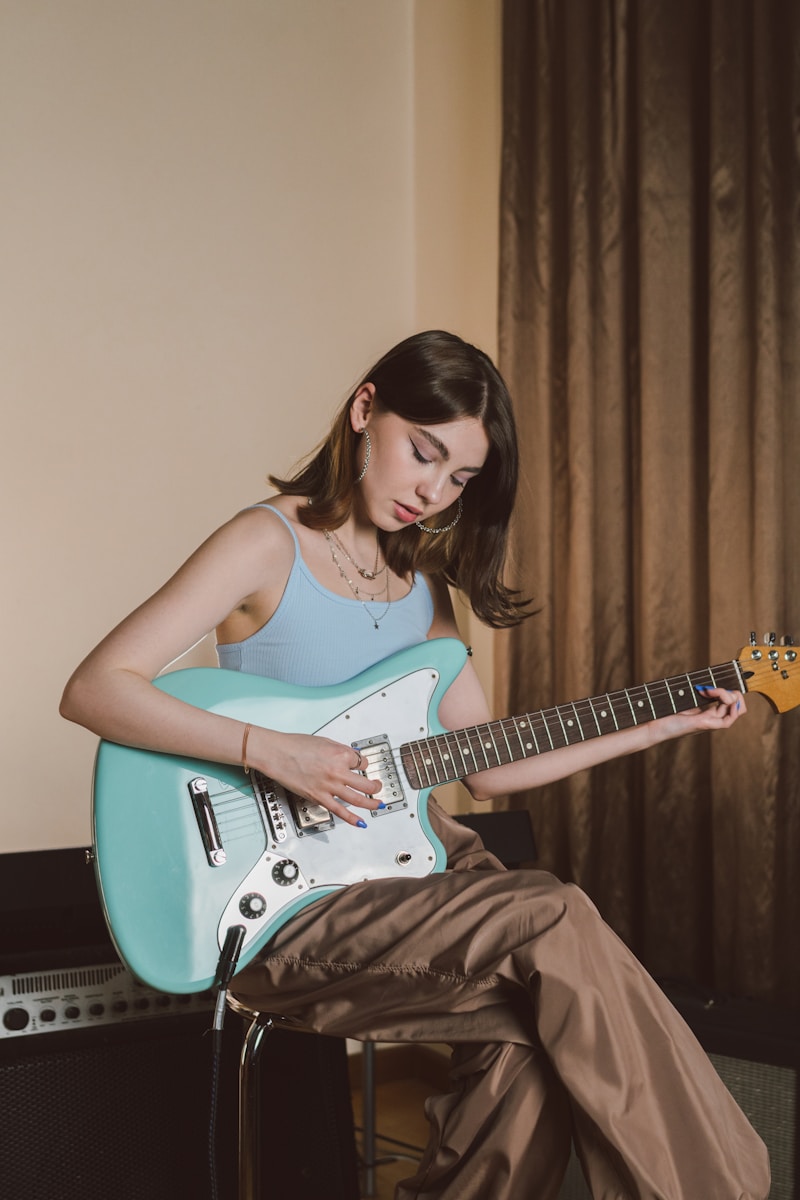 Artist performing with an electric guitar